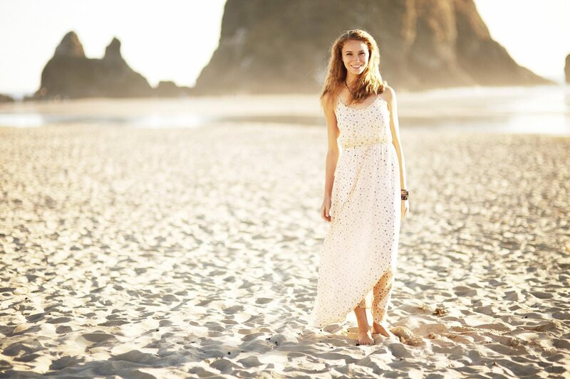 Woman in dress on beach