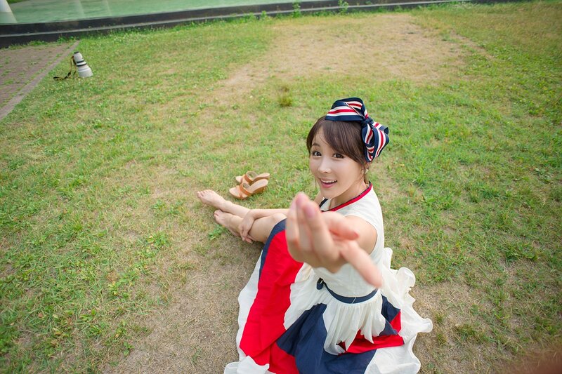 Woman in Dress on Grass — White, Playful