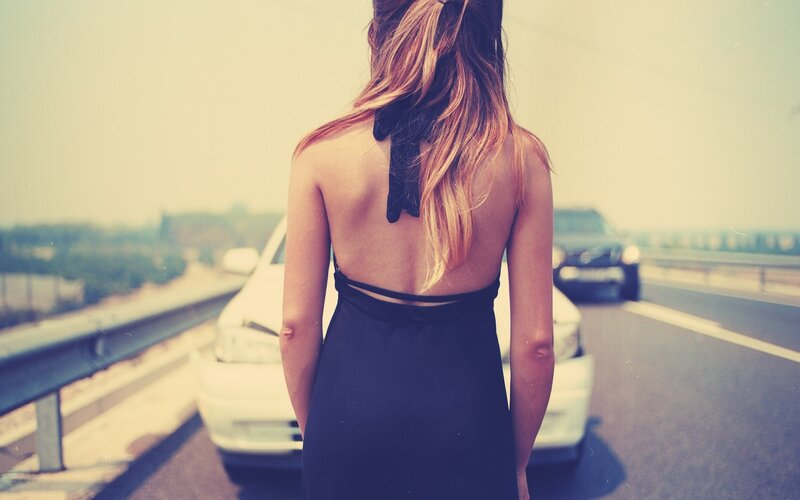 woman in dress on highway