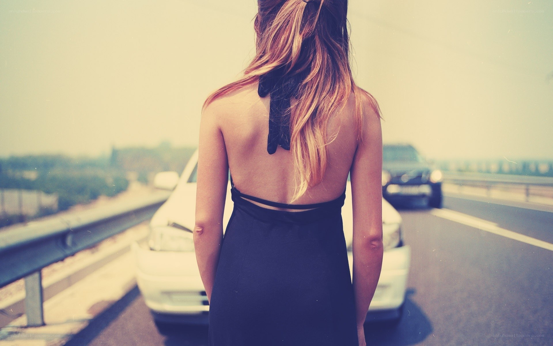 woman in dress on highway
