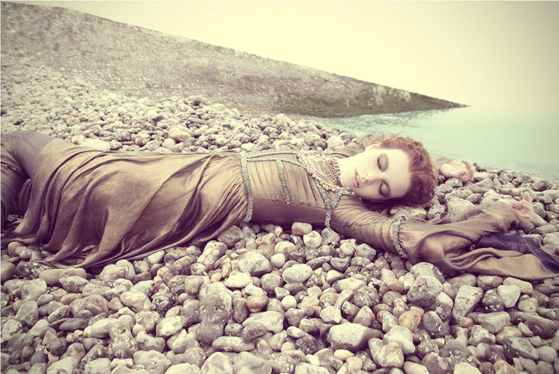 Woman in Dress on Pebbles