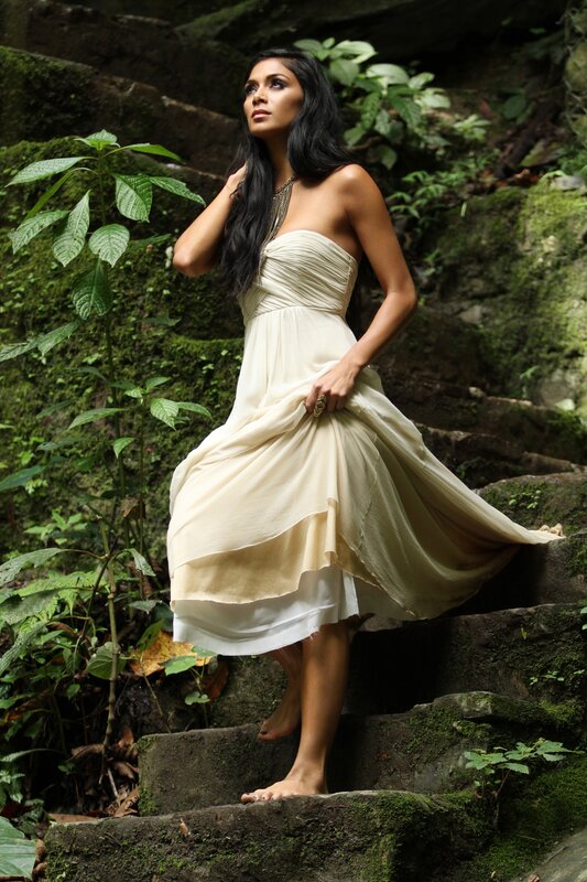 Woman in dress on stone steps