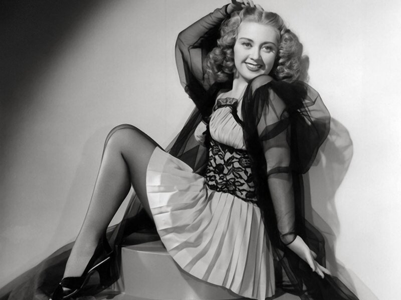Woman in Dress Sitting — Black