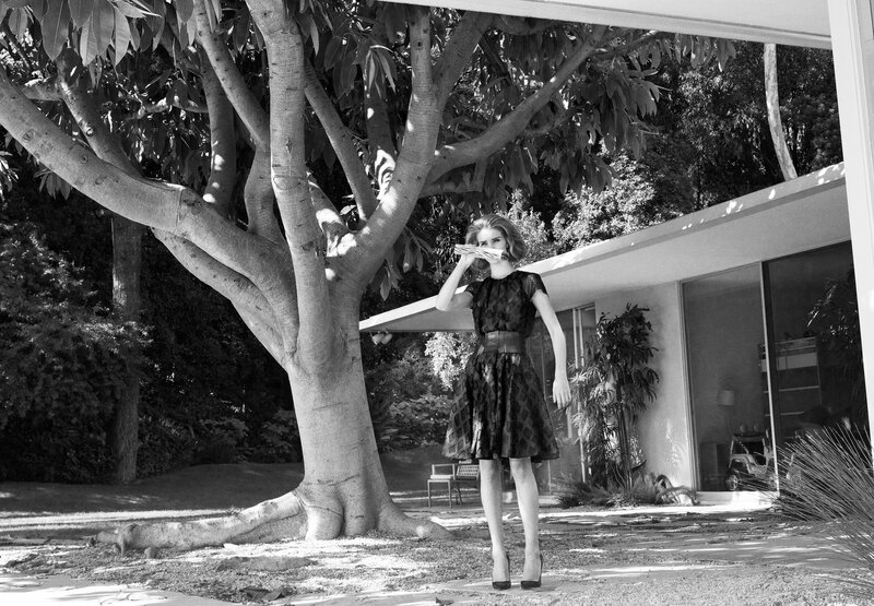 Woman in dress under tree