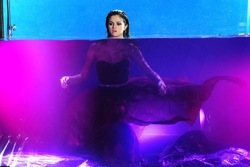 woman in dress underwater
