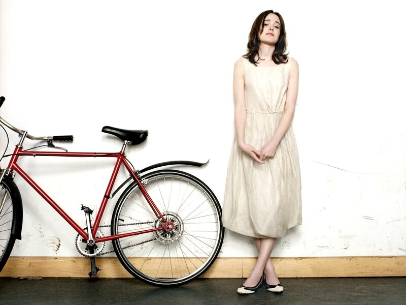 woman in dress with bicycle