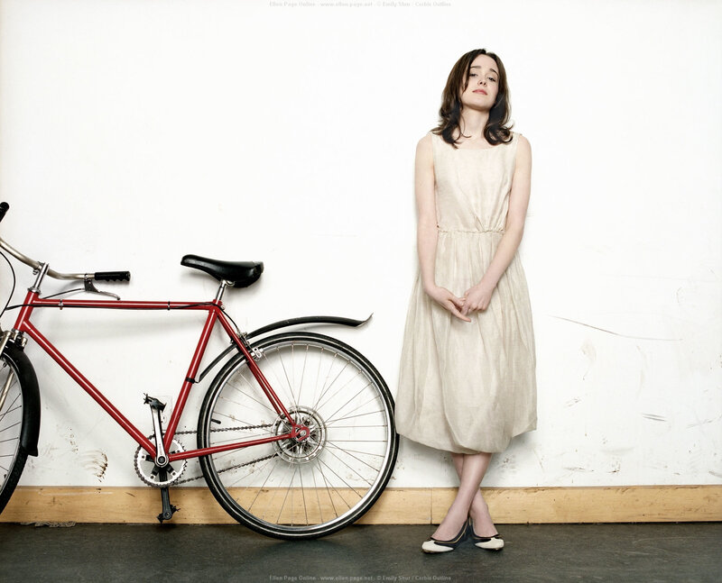 woman in dress with bicycle