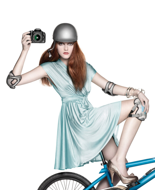 Woman in dress with camera