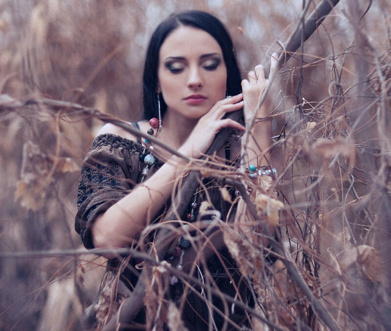 Woman in Dried Vegetation