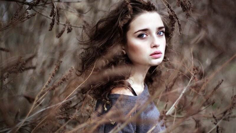 Woman in Dry Grass — Brown, Dramatic