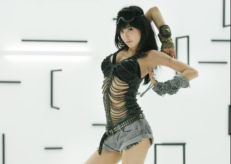 woman in edgy outfit posing