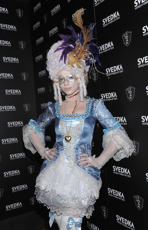 Woman in elaborate costume at event