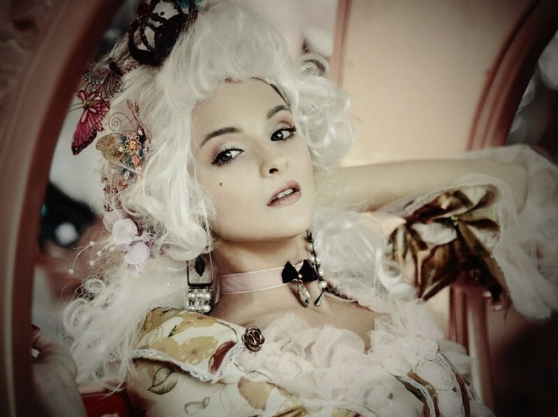 Woman in Elaborate Costume — White, Dramatic