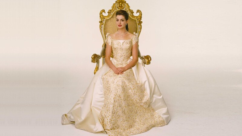 woman in elegant gown on throne