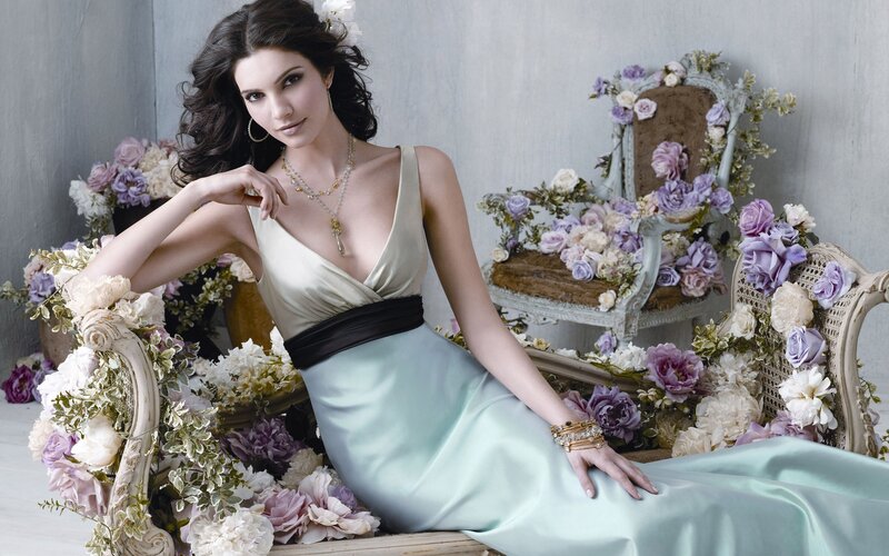 woman in elegant gown with flowers