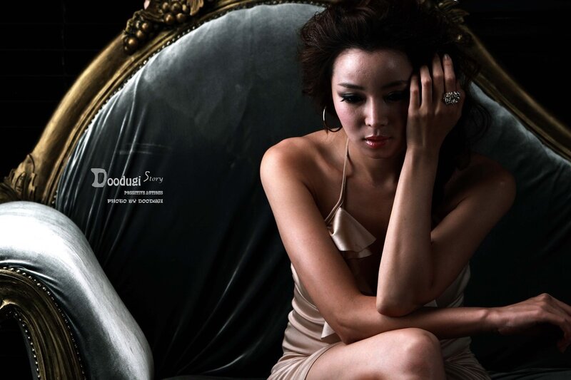 woman in elegant pose on couch