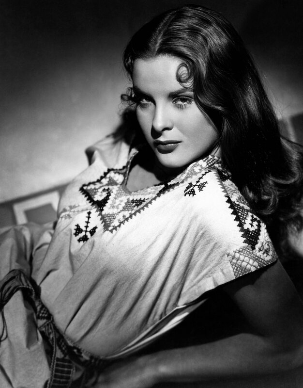 woman in embroidered blouse