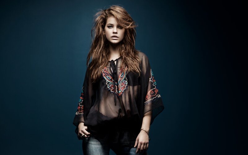 woman in embroidered top