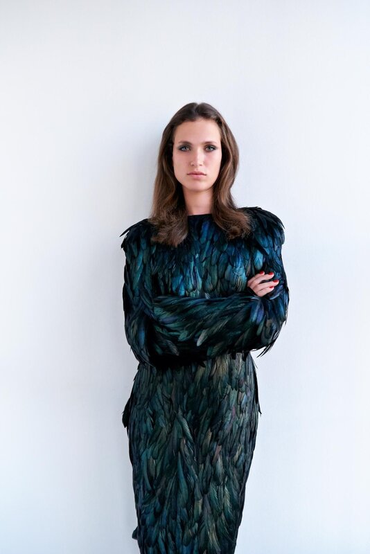 woman in feather dress