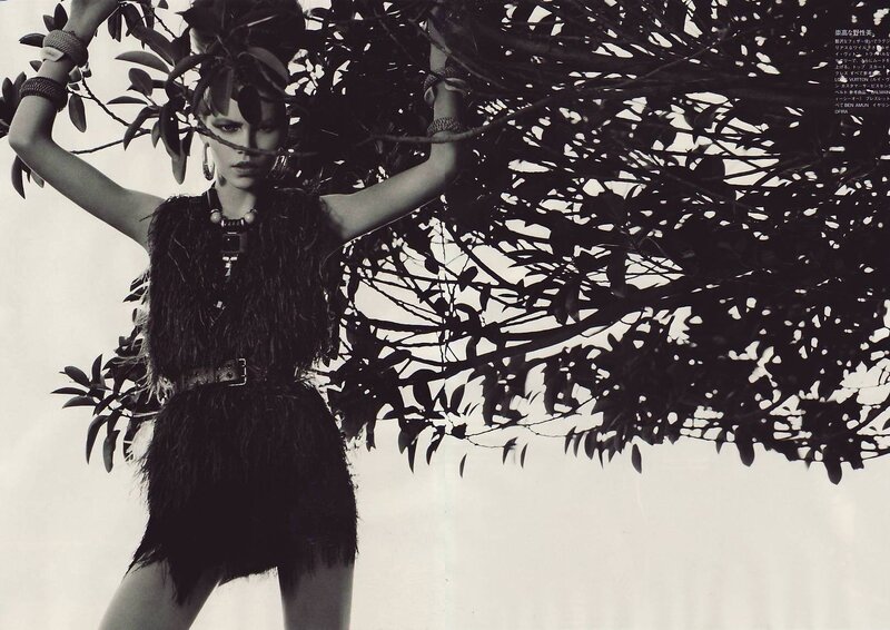 Woman in Feather Dress — Black, Dramatic, Photograph, Tree Branches