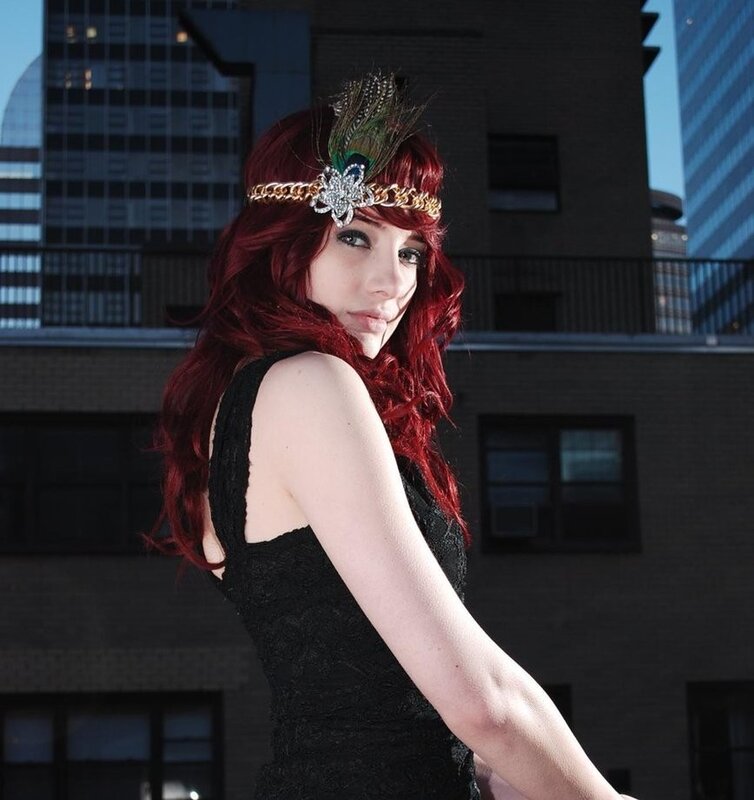 Woman in feather headband