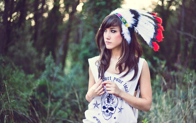 woman in feather headdress