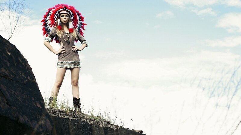 woman in feather headdress