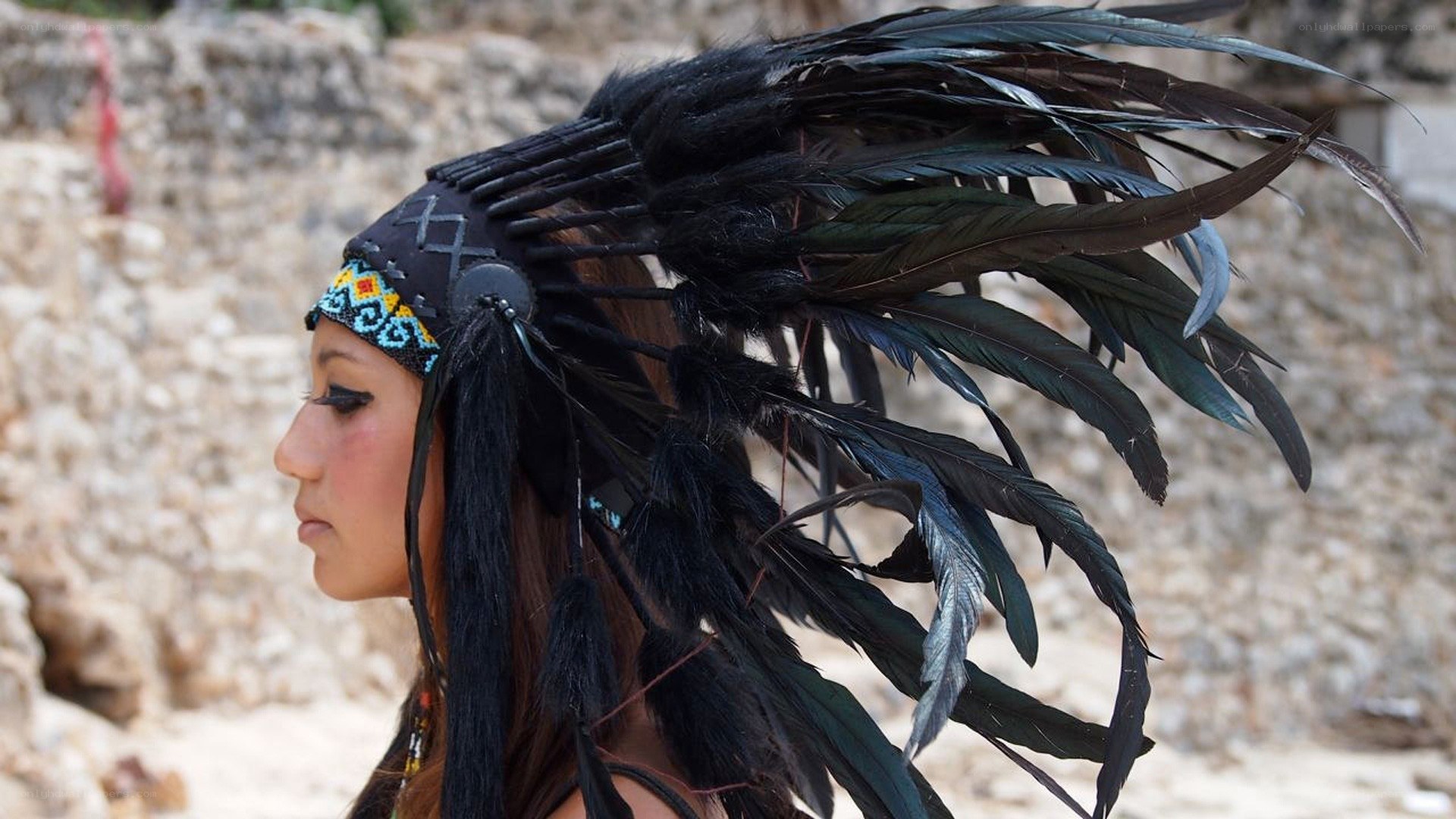 woman in feather headdress
