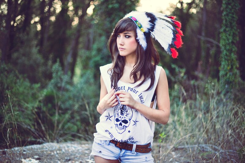 woman in feather headdress