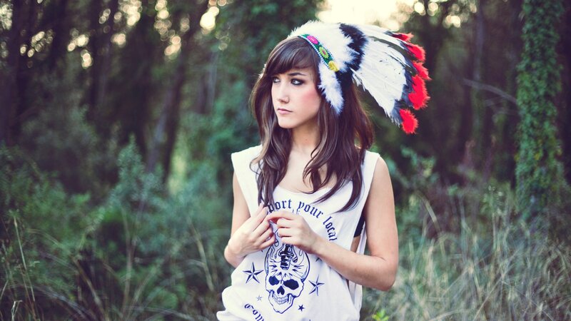 woman in feather headdress