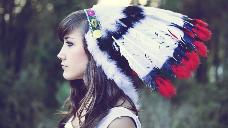 woman in feather headdress