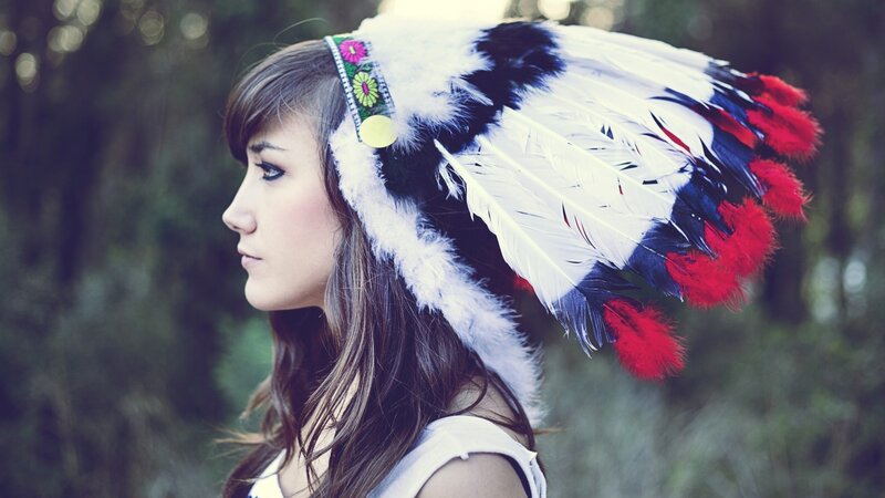 woman in feather headdress