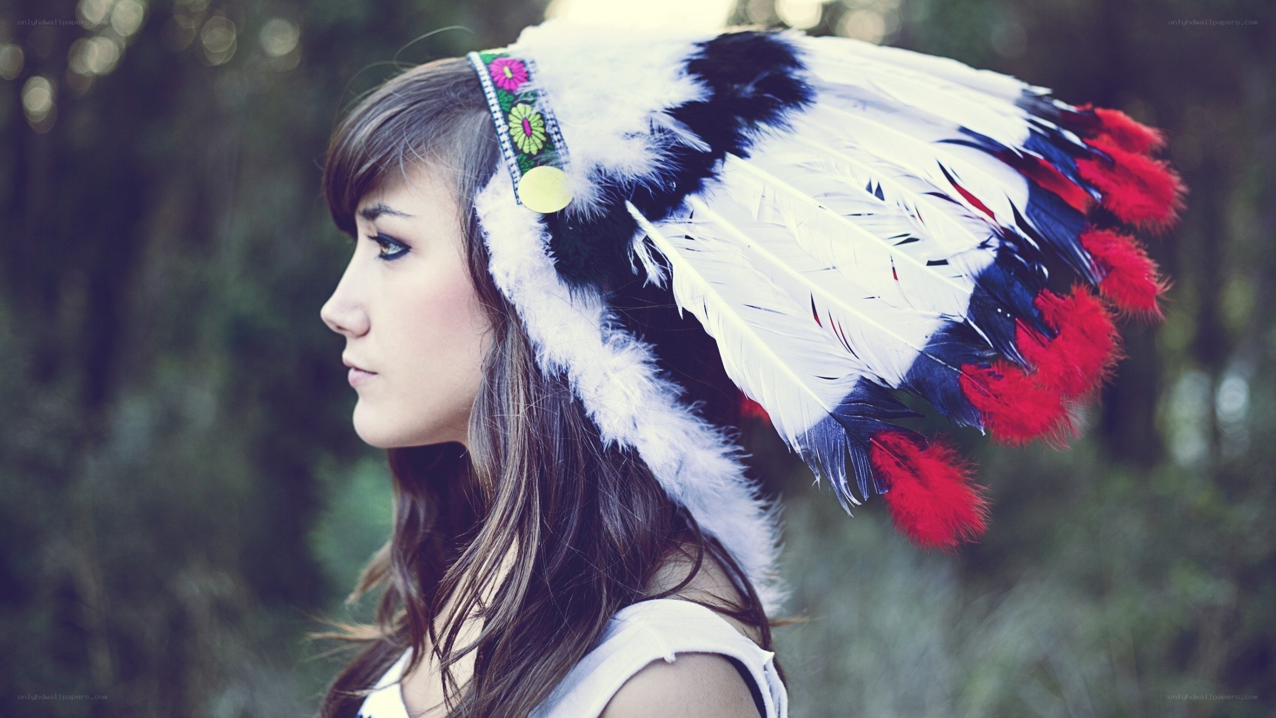woman in feather headdress