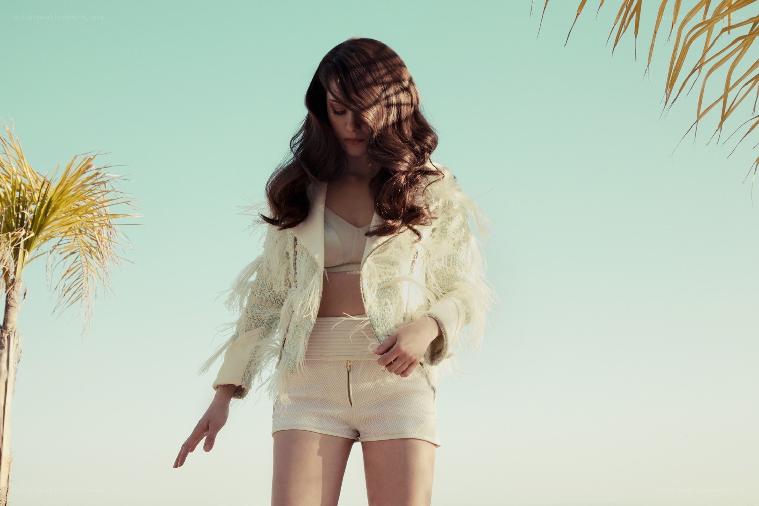 woman in feather jacket