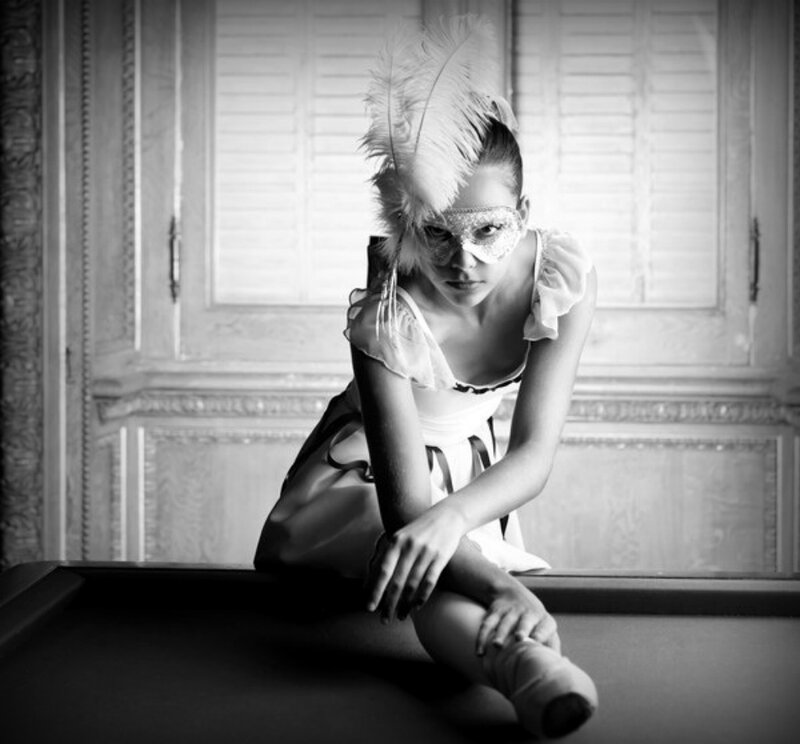 Woman in Feather Mask — Black, Dramatic, Photograph