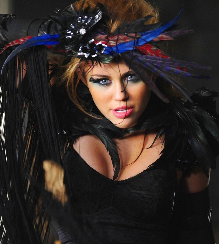woman in feathered costume