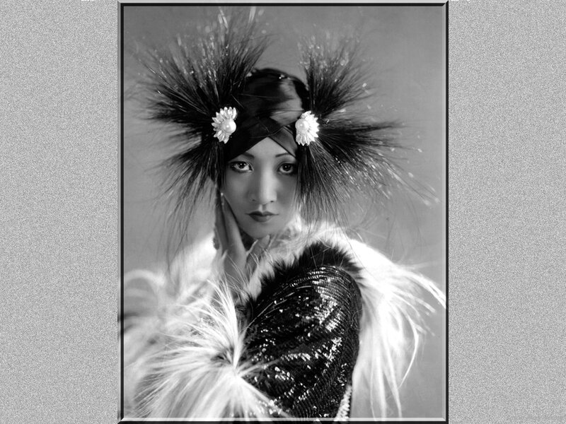 Woman in Feathered Costume — Black, Dramatic, Photograph, Feather Headpiece