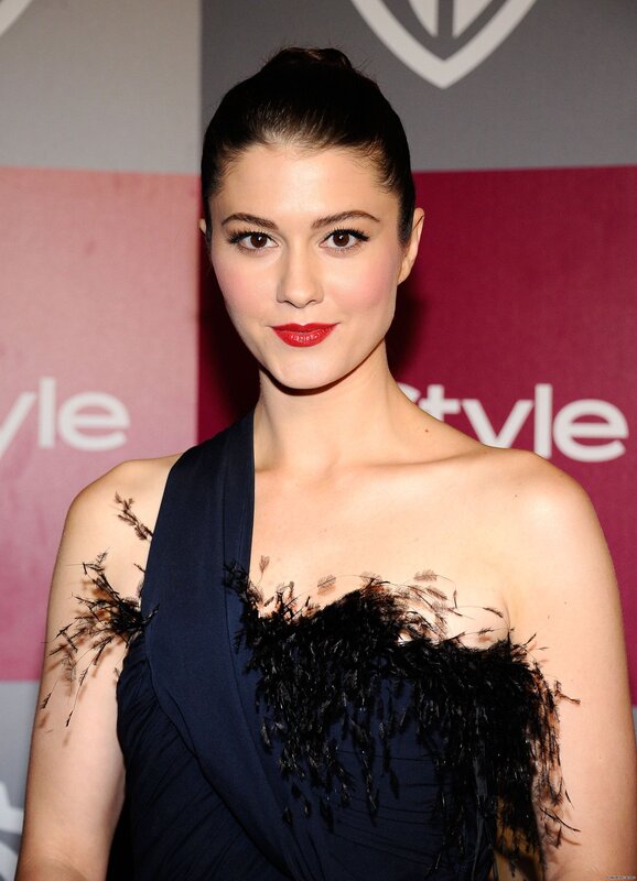 woman in feathered dress