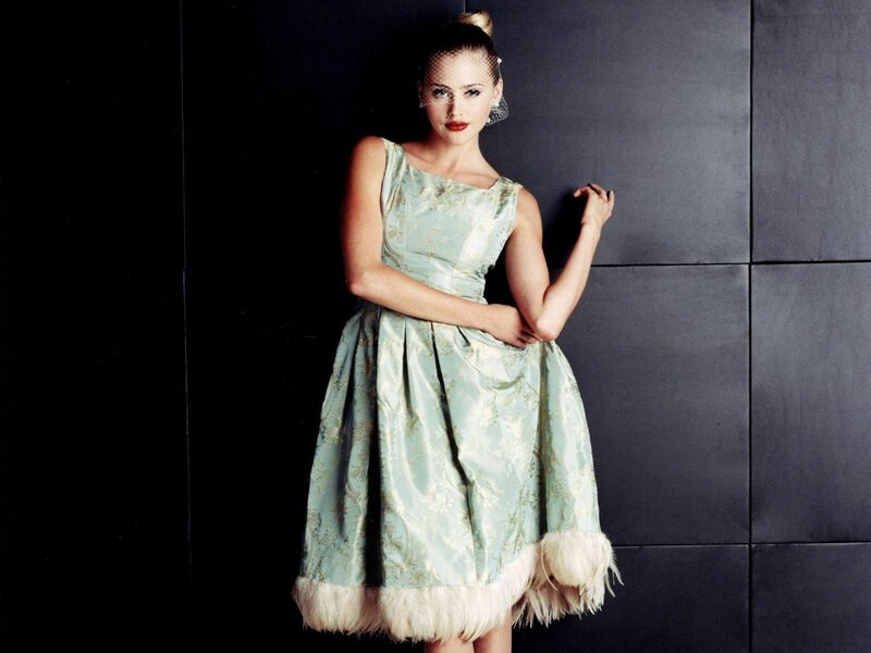 Woman in Feathered Dress — Green, Dramatic, Photograph