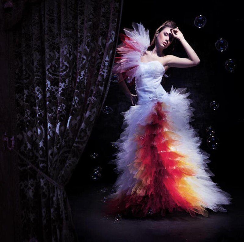 Woman in Feathered Dress — White, Dramatic, Night