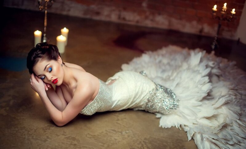 Woman in Feathered Gown — White, Dramatic