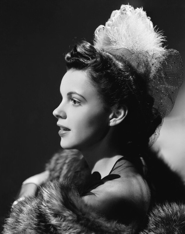 woman in feathered hat portrait