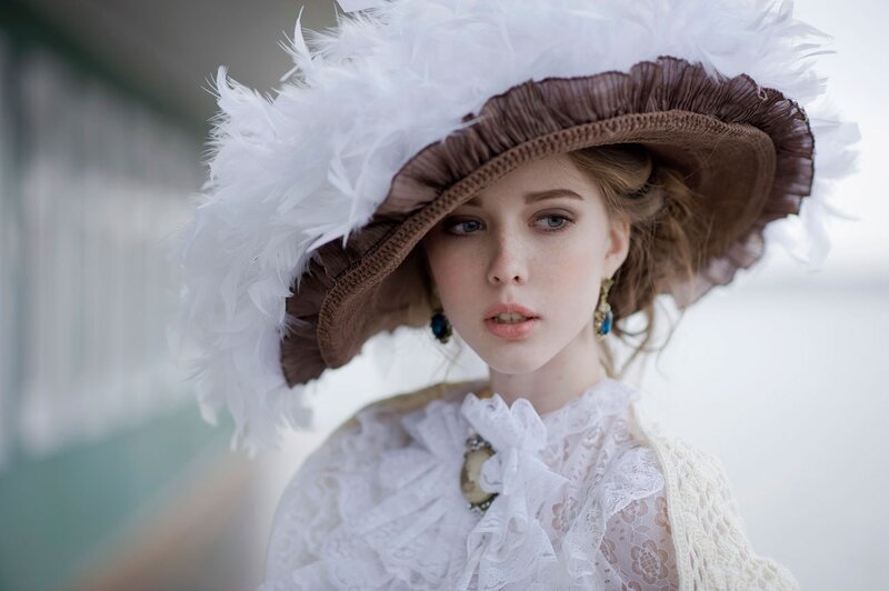 Woman in Feathered Hat — White, Serene
