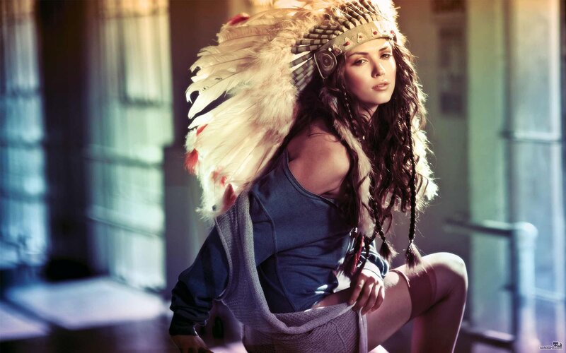 woman in feathered headdress