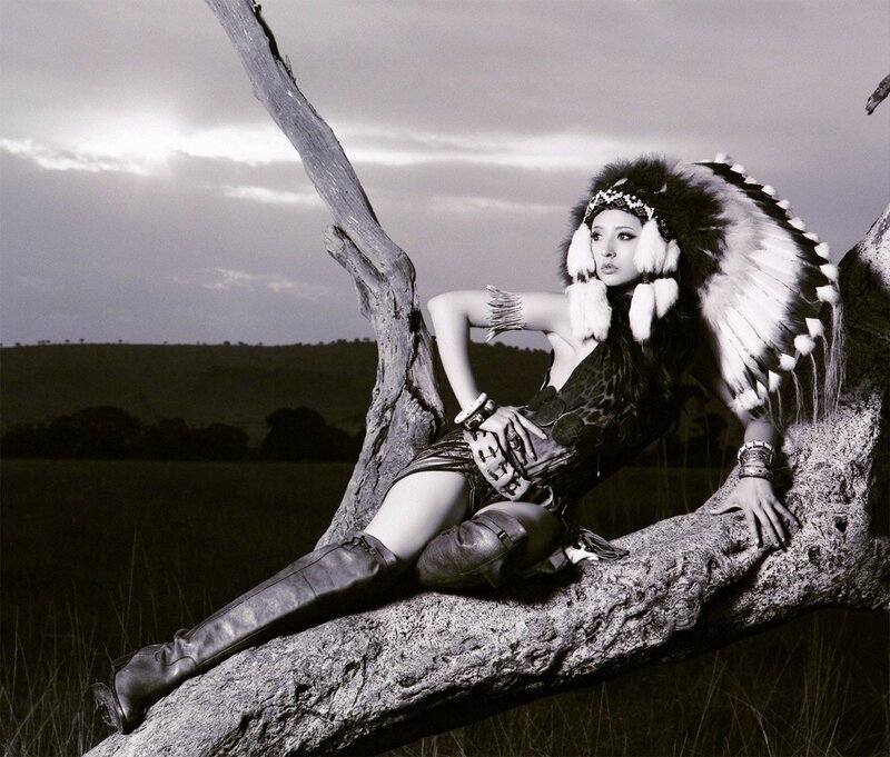 woman in feathered headdress