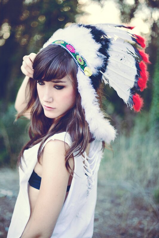 woman in feathered headdress