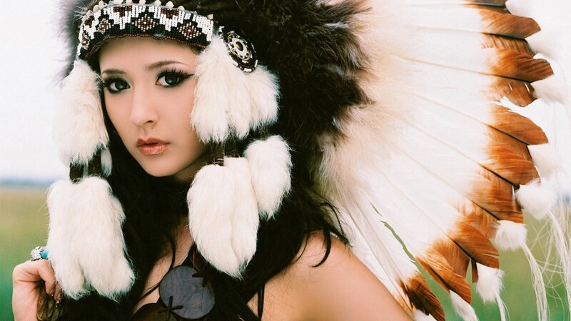 woman in feathered headdress