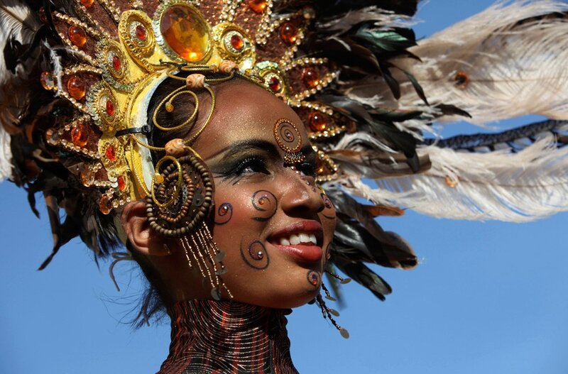 woman in feathered headdress