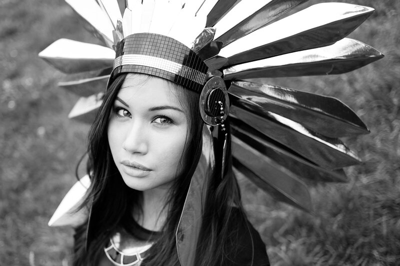woman in feathered headdress