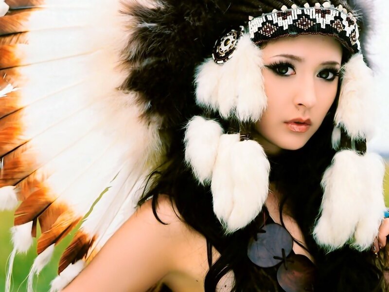 woman in feathered headdress